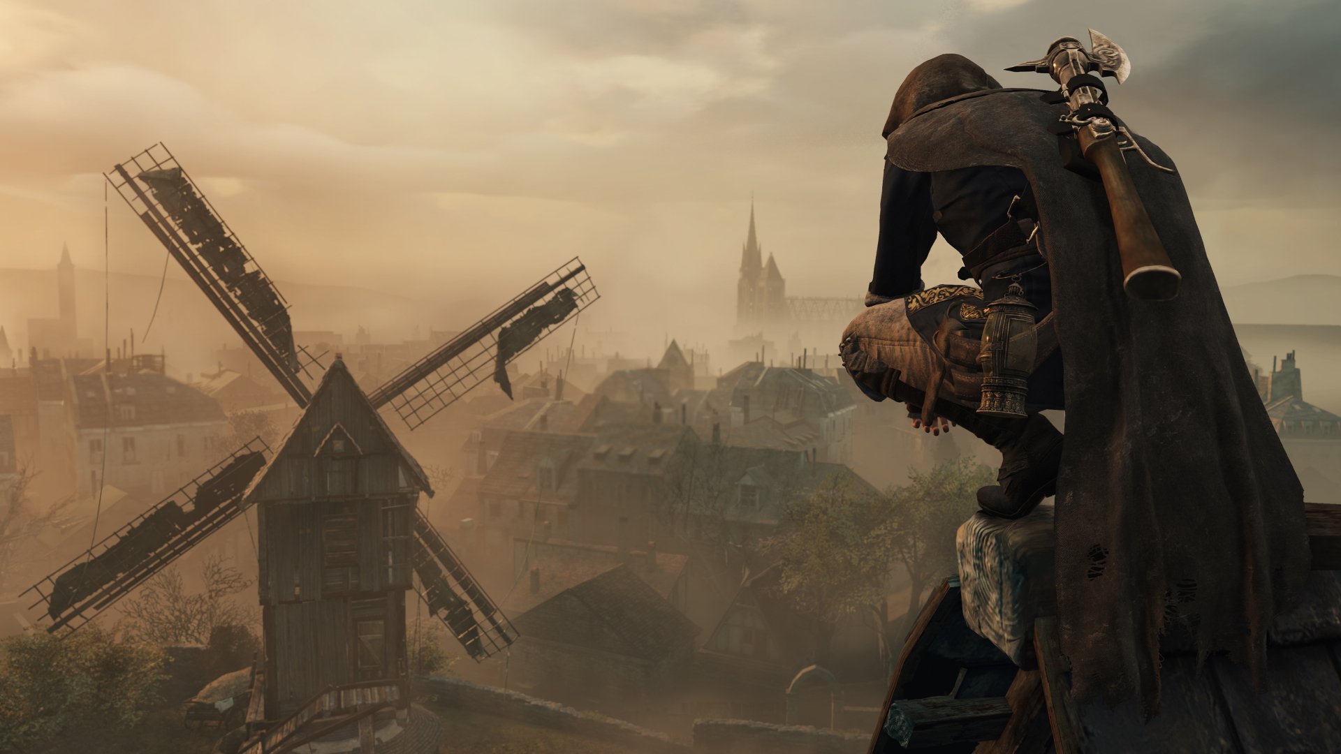 A stunning HD desktop wallpaper from Assassin's Creed: Unity, featuring a cloaked assassin perched on a rock, overlooking a foggy cityscape with a windmill in the foreground.