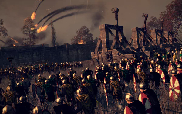 HD PC desktop wallpaper showcasing an epic battle scene from the video game Total War: Attila, featuring armored warriors and catapults under a fiery sky.