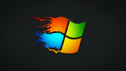 Vibrant 4K Ultra HD desktop wallpaper featuring the iconic Windows logo with dynamic, colorful streaks, showcasing a modern tech aesthetic.
