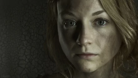 Close-up of Beth Greene, portrayed by Emily Kinney, featured in a dramatic HD wallpaper from the TV show The Walking Dead, highlighting her intense gaze and resilient spirit.