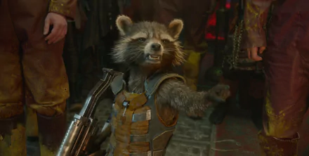 Rocket Raccoon from the movie Guardians of the Galaxy, confidently holding a weapon and ready for action, captured in a vibrant HD desktop wallpaper.