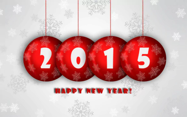 HD PC desktop wallpaper featuring red Christmas ornaments displaying 2015 with snowflakes and Happy New Year! text, celebrating the New Year holiday.