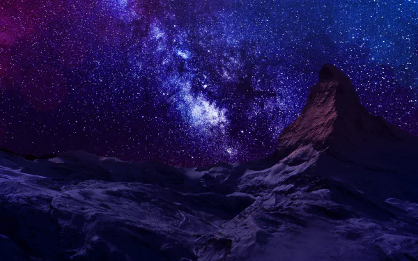 HD desktop wallpaper of a majestic mountain under a starry night sky, showcasing the brilliance of nature with a galaxy of stars illuminating the serene landscape.