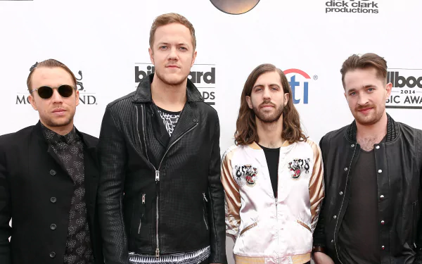 American alternative band Imagine Dragons poses together at a music event, captured in a high-resolution 4K Ultra HD desktop wallpaper image.