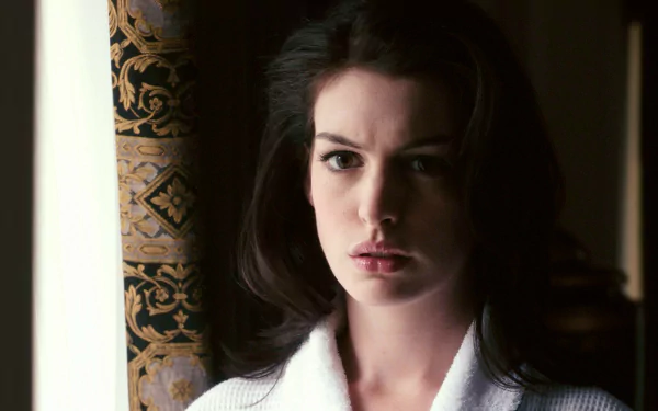 HD PC desktop wallpaper featuring a close-up of celebrity Anne Hathaway's face against a patterned curtain background.