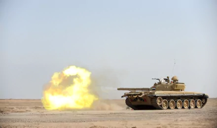 Military T-72 tank firing in a desert setting, captured in striking 4K Ultra HD detail for PC desktop wallpaper and background.