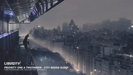 HD PC desktop wallpaper featuring a misty cityscape at night with a solitary figure on a balcony, evoking a calm, music-inspired atmosphere by Liquicity.
