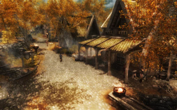 HD desktop wallpaper from the video game The Elder Scrolls V: Skyrim, featuring a peaceful village scene with autumn foliage and rustic wooden buildings.
