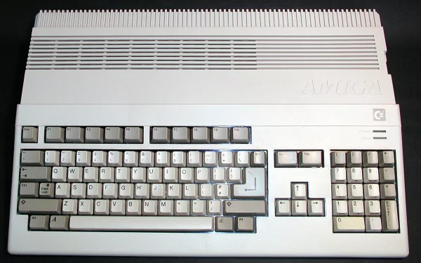 HD desktop wallpaper featuring a close-up of a vintage Commodore Amiga computer keyboard, highlighting classic technology design.