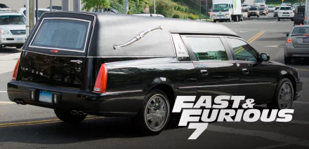 A black hearse parked on a busy street, featured as a HD desktop wallpaper for Furious 7, showcasing a unique vehicle from the iconic movie.