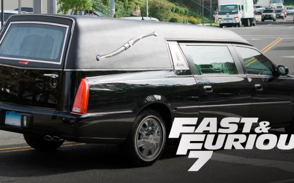 A black hearse parked on a busy street, featured as a HD desktop wallpaper for Furious 7, showcasing a unique vehicle from the iconic movie.