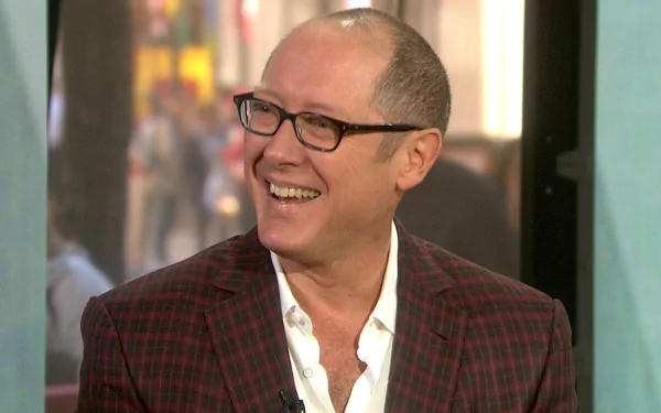 HD desktop wallpaper featuring a smiling man in glasses wearing a plaid jacket, tagged as James Spader.