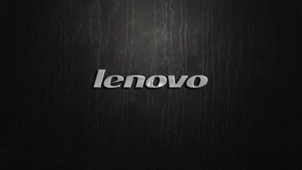 HD PC desktop wallpaper featuring the Lenovo logo in metallic silver against a textured dark background, highlighting technology branding.