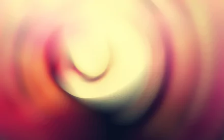 HD desktop wallpaper with abstract, blurred light patterns in warm tones.