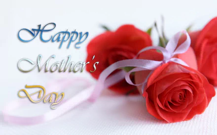 A beautiful HD wallpaper featuring red roses and a ribbon, with the text Happy Mother's Day, celebrating the warmth and love of the holiday.