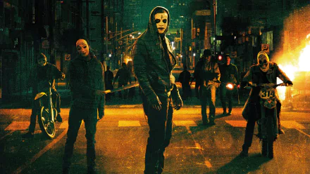 HD PC desktop wallpaper featuring masked figures from the movie The Purge: Anarchy, set against a dark, tense urban street scene at night.