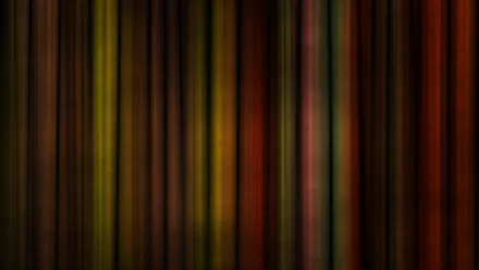 Abstract vertical streaks of warm colors in a vibrant 4K Ultra HD resolution, designed as a dynamic PC desktop wallpaper and background.