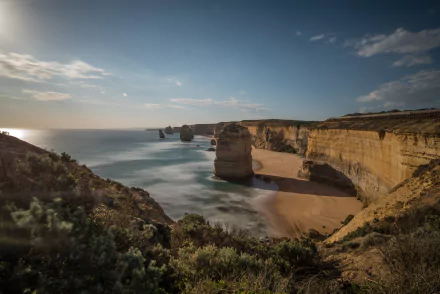 A stunning 4K Ultra HD view of the Twelve Apostles limestone stacks along the Victoria coastline in Australia, showcasing the rugged seascape and natural beauty.