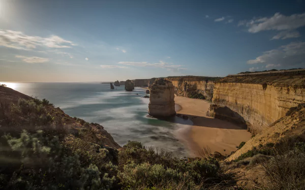 A stunning 4K Ultra HD view of the Twelve Apostles limestone stacks along the Victoria coastline in Australia, showcasing the rugged seascape and natural beauty.