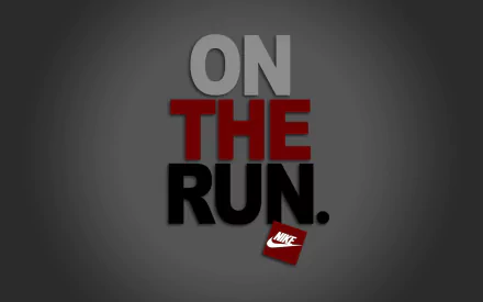 HD desktop wallpaper featuring bold text that reads ON THE RUN in striking colors, accompanied by the Nike logo, emphasizing a sporty and dynamic theme.