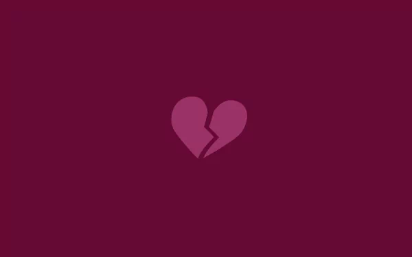 HD desktop wallpaper featuring a broken heart symbol on a deep purple background, expressing the theme of love.