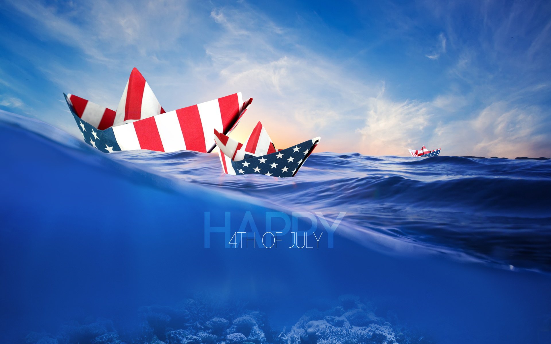 HD PC desktop wallpaper depicting paper boats with American flag designs floating on blue ocean waves under a bright sky, celebrating the 4th of July holiday.
