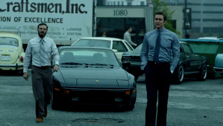 HD desktop wallpaper featuring Joe MacMillan and Gordon Clark from 'Halt and Catch Fire' standing beside a car with a vintage backdrop.