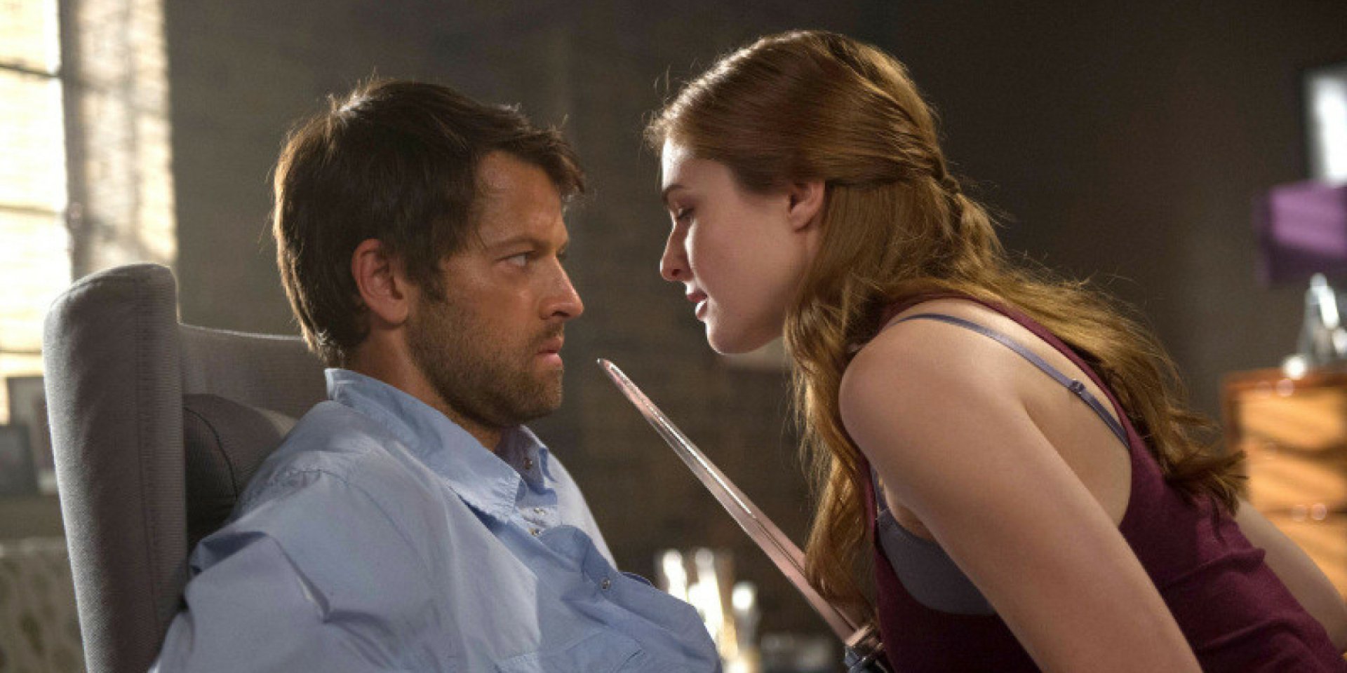 Misha Collins as Castiel in a tense moment from the TV show Supernatural, captured in a high-definition wallpaper that highlights the dramatic intensity of the scene.