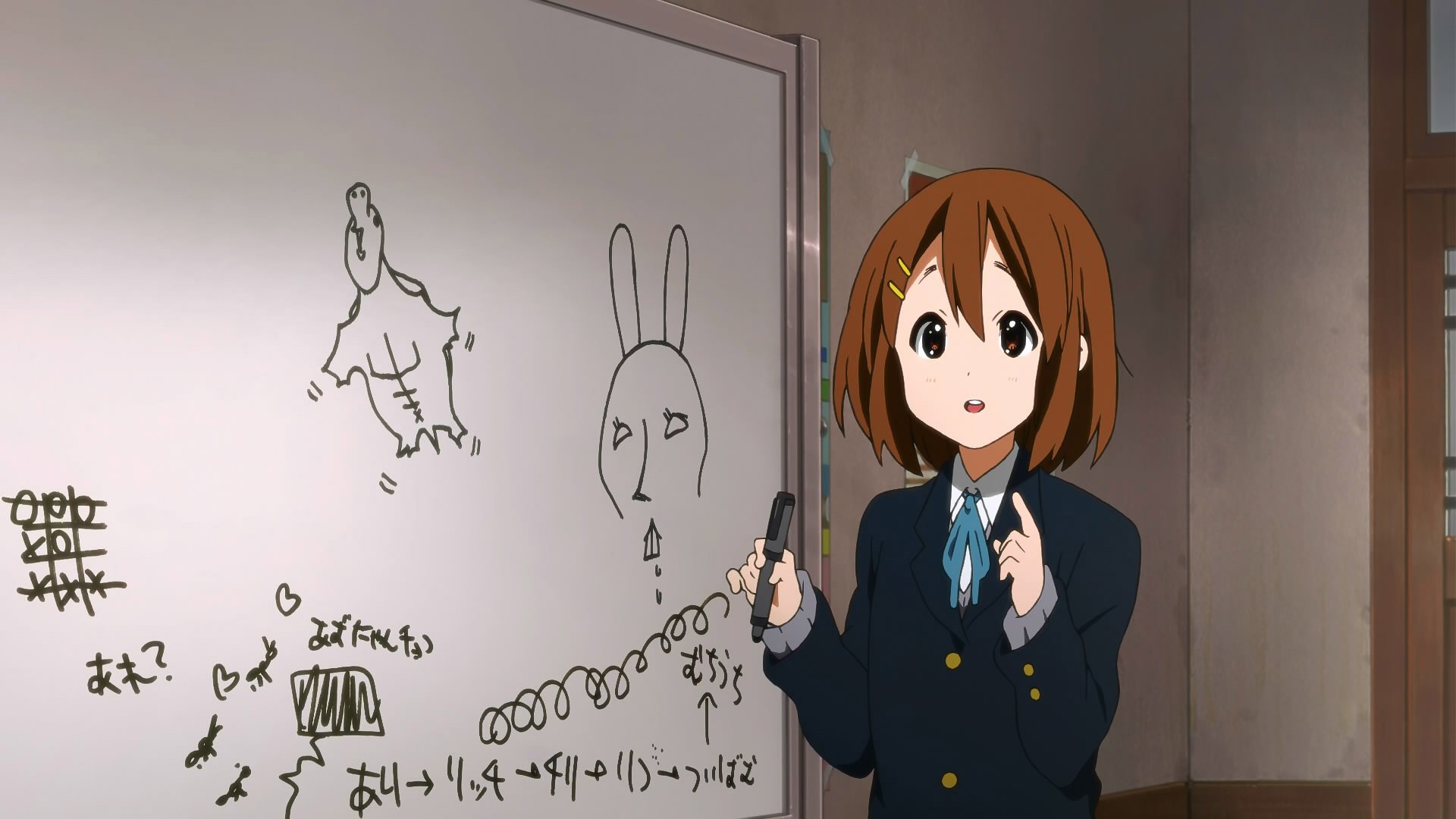 Yui Hirasawa from the anime K-ON! stands in front of a whiteboard with doodles and mathematical notes in this HD PC desktop wallpaper.