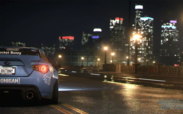 HD desktop wallpaper and background from the video game Need For Speed (2015), featuring a blue car on a city street at night with illuminated skyscrapers in the distance.