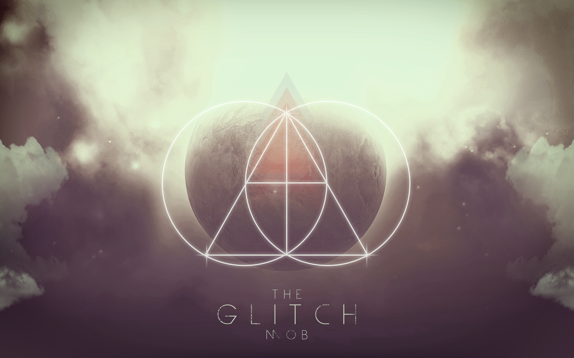 HD wallpaper featuring The Glitch Mob logo with geometric shapes over a celestial backdrop.