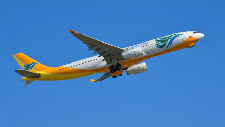 HD desktop wallpaper featuring a Cebu Pacific Air Airbus A330 aircraft in flight against a clear blue sky.