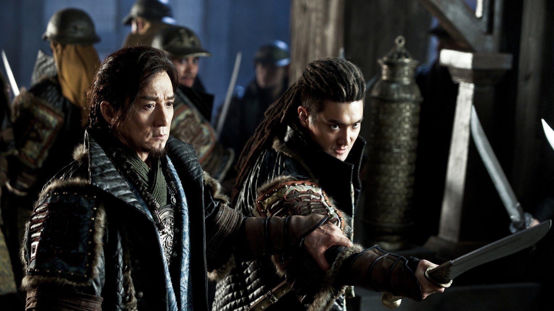 HD PC desktop wallpaper featuring intense characters from the movie Dragon Blade, showcasing detailed costumes and a dramatic scene in a dimly lit setting.