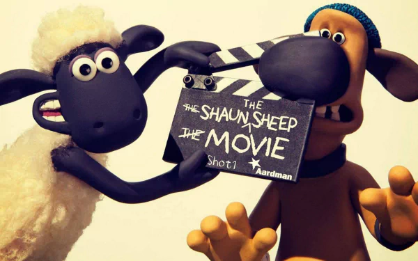 HD PC desktop wallpaper/background from Shaun the Sheep Movie: Shaun holds a clapperboard reading The Shaun the Sheep Movie while Bitzer the dog looks on.