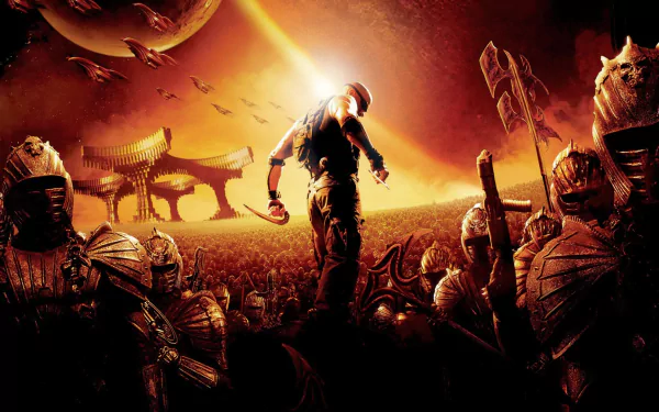 HD PC desktop wallpaper featuring Vin Diesel in character as Riddick, surrounded by armored warriors and an intense fiery background.