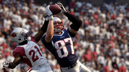 HD desktop wallpaper from Madden NFL 16 featuring an in-game action shot of a football player catching a pass during a match.