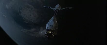 HD PC desktop wallpaper/background featuring the Event Horizon movie ship drifting through deep space with a shadowed planet looming in the background.