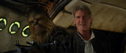 HD wallpaper featuring Chewbacca and Han Solo (Harrison Ford) from Star Wars Episode VII: The Force Awakens, standing together in a spaceship.
