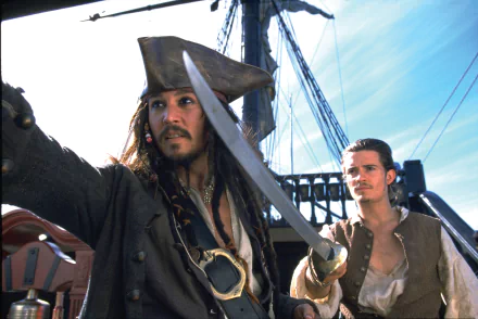 HD desktop wallpaper featuring Johnny Depp as Jack Sparrow and Orlando Bloom as Will Turner from the movie Pirates of the Caribbean: The Curse of the Black Pearl.