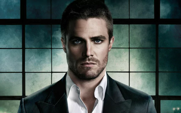 A striking HD wallpaper featuring Stephen Amell, known for his role in the TV show Arrow, with a dramatic backdrop that enhances his intense expression.