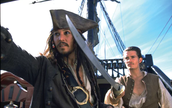 HD desktop wallpaper featuring Johnny Depp as Jack Sparrow and Orlando Bloom as Will Turner from the movie Pirates of the Caribbean: The Curse of the Black Pearl.
