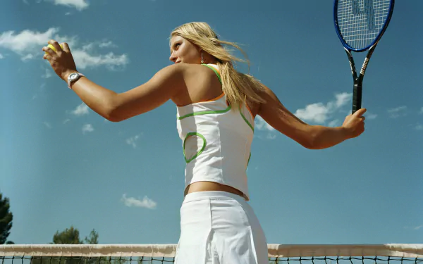 Maria Sharapova in action on the tennis court, captured in a vibrant 4K Ultra HD sports desktop wallpaper.