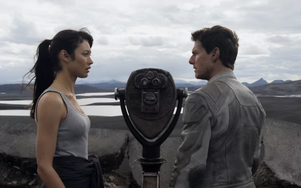 Tom Cruise and Olga Kurylenko stand facing each other at a vista, with a futuristic viewer between them, in a scene from the movie Oblivion. 4K Ultra HD wallpaper.