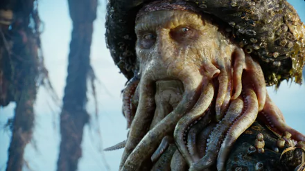 Davy Jones from Pirates of the Caribbean: Dead Man's Chest is depicted in this high-definition desktop wallpaper, featuring his distinctive tentacled appearance and pirate attire.