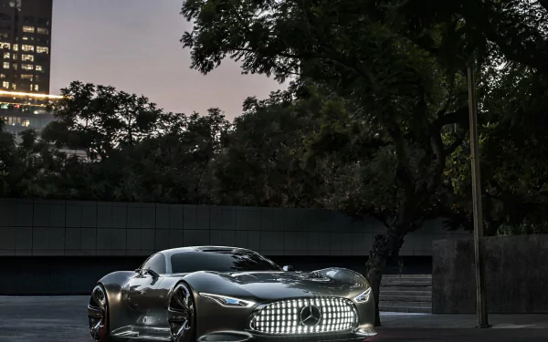 Sleek Mercedes-Benz AMG Vision Gran Turismo vehicle parked on a dim city street, glossy chrome body reflecting trees and high-rises, HD PC desktop wallpaper/background.