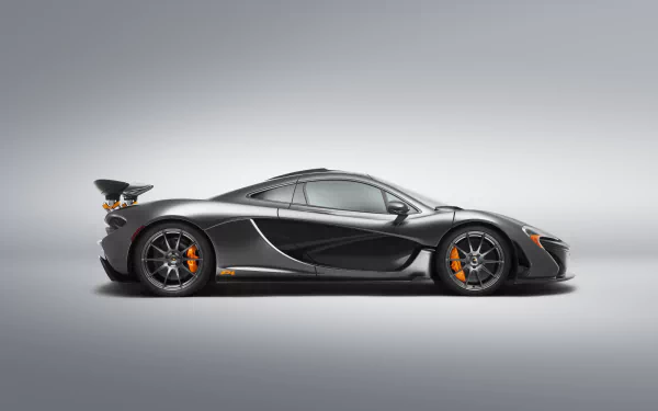 Side view of a sleek McLaren P1 sports car showcased in a 4K Ultra HD PC desktop wallpaper and background.