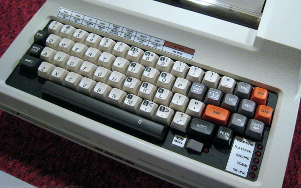 A close-up view of a vintage keyboard showcasing its unique layout and design. This HD PC desktop wallpaper emphasizes technology and nostalgia in a sleek format.