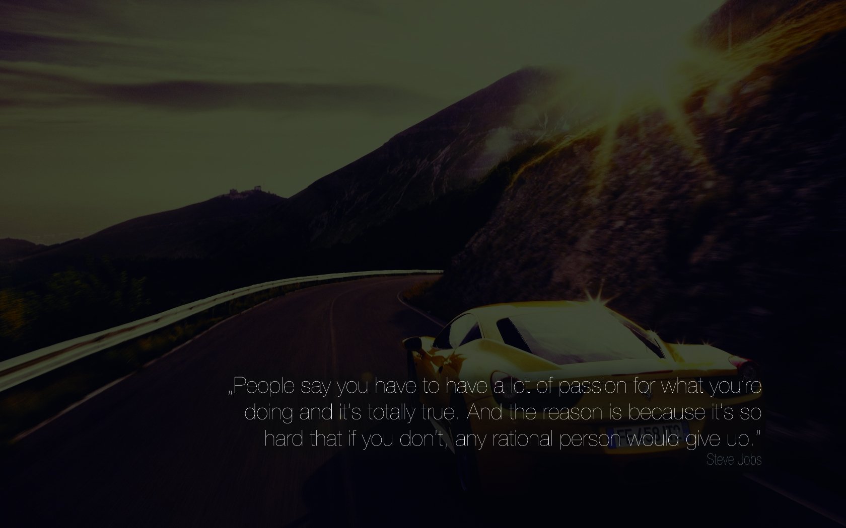 A scenic HD desktop wallpaper featuring an inspirational quote by Steve Jobs about passion and dedication, set against a backdrop of a mountain road and a white car.