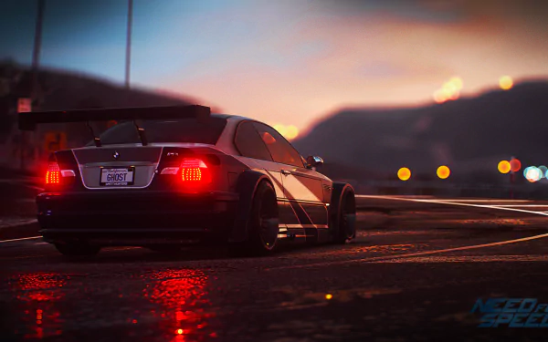HD desktop wallpaper from Need For Speed (2015), featuring a sleek car at dusk on a winding road, with colorful lights reflecting off the wet surface.