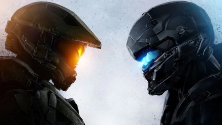 HD desktop wallpaper featuring Master Chief from Halo 5: Guardians, showcasing an intense face-off with another Spartan, set against a misty, atmospheric background.